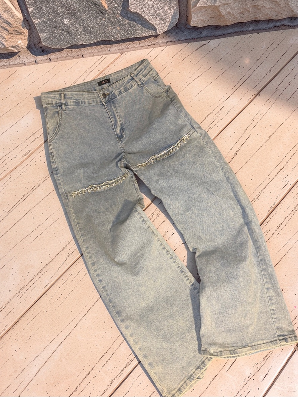 Light Wash Wide-Leg Jeans with Cutouts just above knee with crystal bling.
